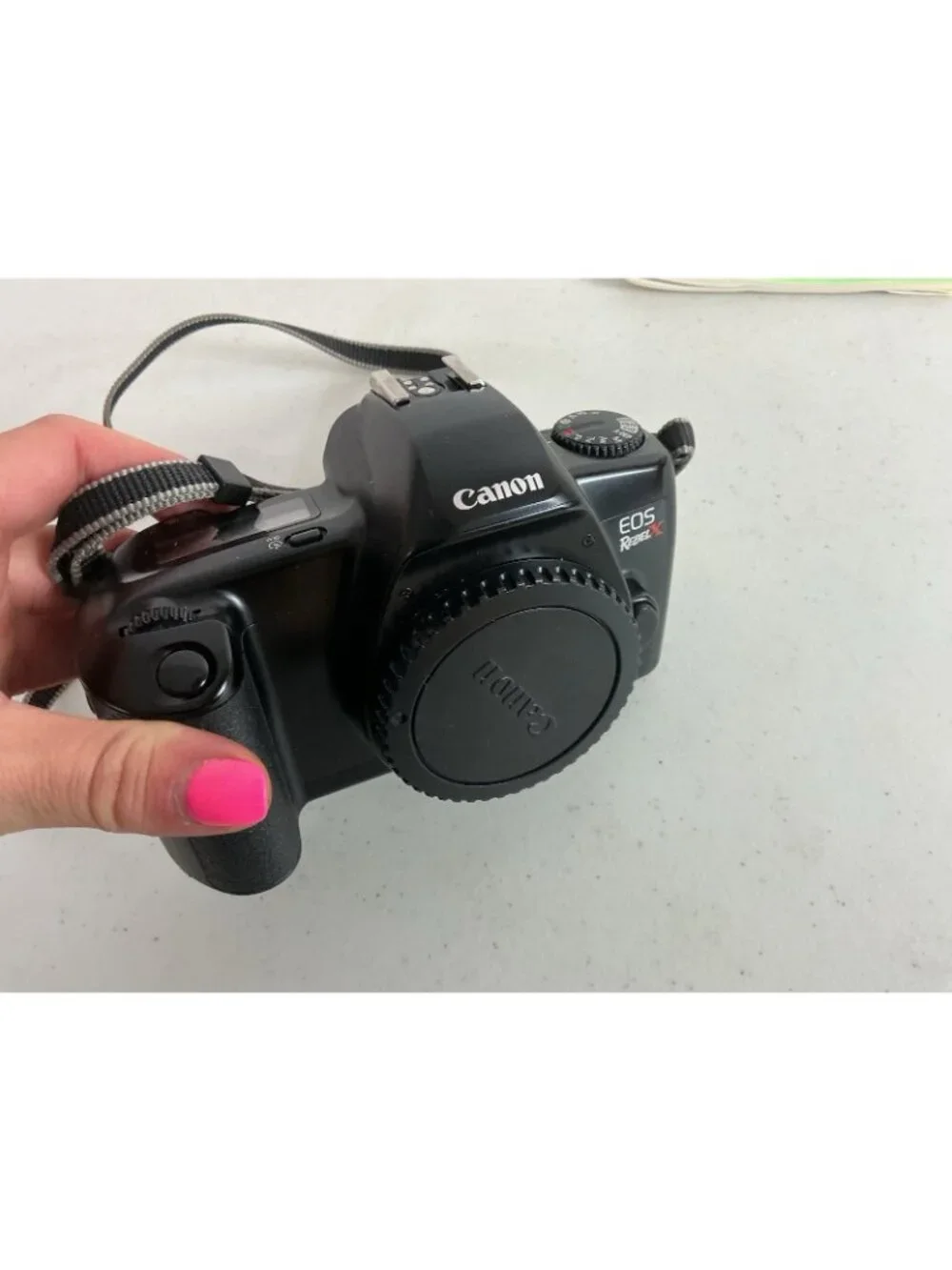 Canon EOS Rebel X S 35mm SLR Film Camera with Strap & Booklet Film Included